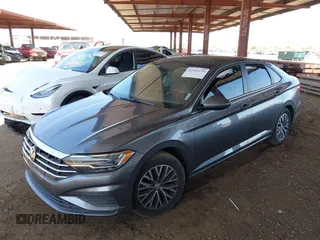 2019 Volkswagen Jetta S with VIN 3VWC57BUXKM256263, listed as a IAAI auction lot 42466179 with 67,598 mi miles and . Bid and sale history available at DreamBid. Image 2.