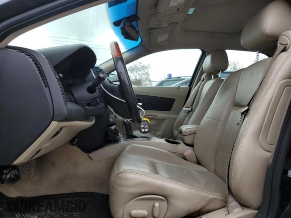 2004 Cadillac CTS with VIN 1G6DM577340110541, listed as a Copart auction lot 79263544 with 156,822 mi miles and Salvage Title. Bid and sale history available at carsss.com. Image 7.