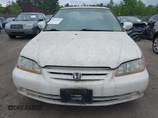 2001 Honda Accord EX z VIN 1HGCG16591A053150, wystawiony jako IAAI lot #42365043 z przebiegiem 263 431 mil mil oraz . Historia ofert i sprzedaży dostępna na DreamBid. Obrazek 6.