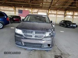 2014 Dodge Journey American Value with VIN 3C4PDCAB2ET301688, listed as a Copart auction lot 54731275 with 108,064 mi miles and Salvage Title. Bid and sale history available at DreamBid. Image 14.
