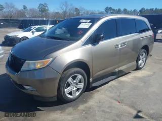 2013 Honda Odyssey Touring with VIN 5FNRL5H96DB066008, listed as a IAAI auction lot 41734055 with 120,292 mi miles. Bid and sale history available at carsss.com. Image 17.