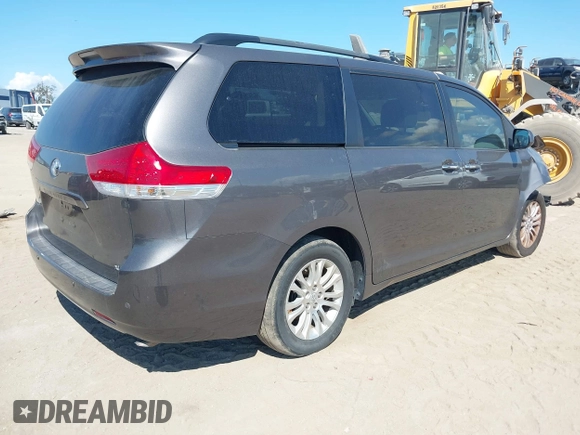 2012 Toyota Sienna XLE AAS with VIN 5TDYK3DC1CS186331, listed as a IAAI auction lot 41545031 with 240,788 mi miles and . Bid and sale history available at DreamBid. Image 4.