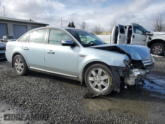 2009 Ford Taurus Limited with VIN 1FAHP25W09G118549, listed as a Copart auction lot 43234475 with 105,074 mi miles and Salvage Title. Bid and sale history available at carsss.com. Image 4.
