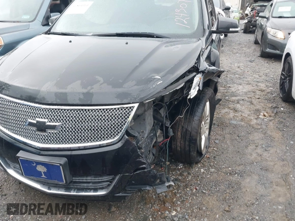 2013 Chevrolet Traverse LT with VIN 1GNKVJKD9DJ124307, listed as a IAAI auction lot 41864010 with 123,458 mi miles and . Bid and sale history available at DreamBid. Image 6.