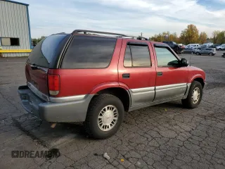 1999 GMC Jimmy SLE with VIN 1GKDT13W6X2508118, listed as a Copart auction lot 79761444 with 195,738 mi miles and Salvage Title. Bid and sale history available at carsss.com. Image 3.