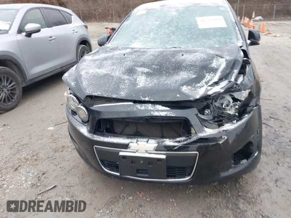 2014 Chevrolet Sonic LS with VIN 1G1JA6SH6E4139131, listed as a IAAI auction lot 41727625 with 97,241 mi miles and . Bid and sale history available at DreamBid. Image 6.