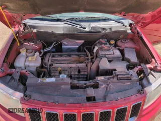 2016 Jeep Compass Sport z VIN 1C4NJCBA9GD777211, wystawiony jako Copart lot #47849215 z przebiegiem 118 804 mil mil oraz Szkoda całkowita • Salvage title. Historia ofert i sprzedaży dostępna na DreamBid. Obrazek 11.