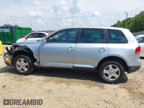 2007 Volkswagen Touareg V6 z VIN WVGZE77L57D000964, wystawiony jako IAAI lot #42159667 z przebiegiem 143 542 mil mil oraz . Historia ofert i sprzedaży dostępna na DreamBid. Obrazek 14.