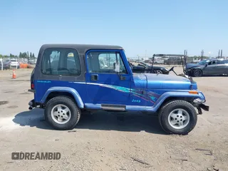 1995 Jeep Wrangler z VIN 1J4FY29S3SP213368, wystawiony jako IAAI lot #42425240 z przebiegiem 96 473 mil mil oraz . Historia ofert i sprzedaży dostępna na DreamBid. Obrazek 13.