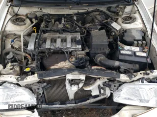 2001 Mazda 626 LX z VIN 1YVGF22C515251837, wystawiony jako Copart lot #56854605 z przebiegiem 173 148 mil mil oraz Szkody całkowita. Historia ofert i sprzedaży dostępna na DreamBid. Obrazek 11.