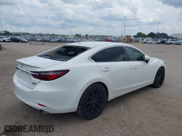 2018 Mazda 6 Grand Touring Reserve with VIN JM1GL1WY1J1321517, listed as a IAAI auction lot 39411226 with 50,280 mi miles and . Bid and sale history available at DreamBid. Image 4.
