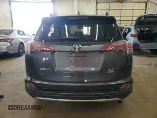 2018 Toyota RAV4 XLE with VIN JTMRFREV1JJ736777, listed as a Copart auction lot 52329605 with 60,069 mi miles and Salvage Title. Bid and sale history available at carsss.com. Image 6.