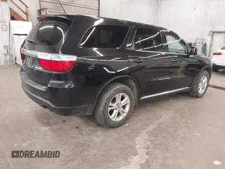 2013 Dodge Durango SXT with VIN 1C4RDJAG0DC512293, listed as a IAAI auction lot 41875919 with 191,128 mi miles and . Bid and sale history available at DreamBid. Image 4.