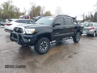 2015 Toyota Tacoma with VIN 3TMLU4ENXFM185371, listed as a IAAI auction lot 41952513 with 87,128 mi miles and . Bid and sale history available at DreamBid. Image 2.