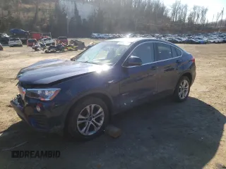 2015 BMW X4 xDrive28i with VIN 5UXXW3C59F0M88054, listed as a Copart auction lot 40534343 with 69,369 mi miles. Bid and sale history available at carsss.com. Image 1.