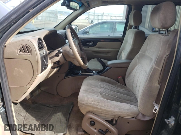 2004 GMC Envoy SLT with VIN 1GKDT13S342384687, listed as a Copart auction lot 78331613 with 183,774 mi miles and Clean Title. Bid and sale history available at carsss.com. Image 7.