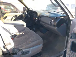 1999 Dodge Ram 1500 with VIN 1B7HC13Z3XJ580696, listed as a IAAI auction lot 41311605 with 244,120 mi miles. Bid and sale history available at carsss.com. Image 5.