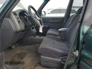 2000 Toyota RAV4 with VIN JT3GP10V6Y7066183, listed as a Copart auction lot 53972305 with 213,886 mi miles and Clean title. Bid and sale history available at DreamBid. Image 7.