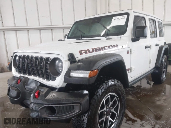 2024 Jeep Wrangler Rubicon with VIN 1C4PJXFG7RW334190, listed as a IAAI auction lot 42332948 with 14,272 mi miles and . Bid and sale history available at DreamBid. Image 2.