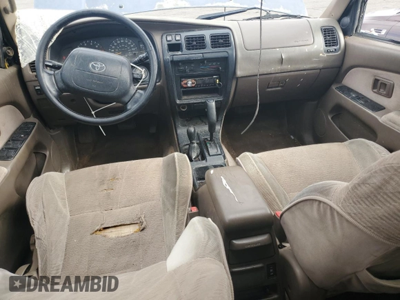 1997 Toyota 4Runner SR5 z VIN JT3HN86R9V0059388, wystawiony jako Copart lot #59231815 z przebiegiem 310 270 mil mil oraz Szkoda całkowita • Salvage title. Historia ofert i sprzedaży dostępna na DreamBid. Obrazek 8.