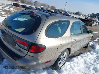 2003 Ford Taurus SE Standard with VIN 1FAFP58U73A279364, listed as a IAAI auction lot 41500005 with 148,781 mi miles. Bid and sale history available at carsss.com. Image 4.