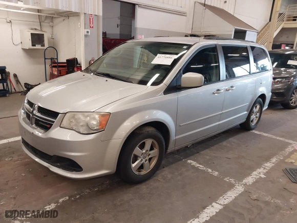 2012 Dodge Grand Caravan SXT with VIN 2C4RDGCGXCR318537, listed as a IAAI auction lot 41770886 with 150,005 mi miles. Bid and sale history available at carsss.com. Image 17.