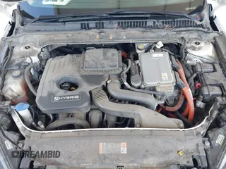 2013 Ford Fusion SE Hybrid z VIN 3FA6P0LU1DR310075, wystawiony jako IAAI lot #42085556 z przebiegiem Nie podano mil oraz . Historia ofert i sprzedaży dostępna na DreamBid. Obrazek 10.