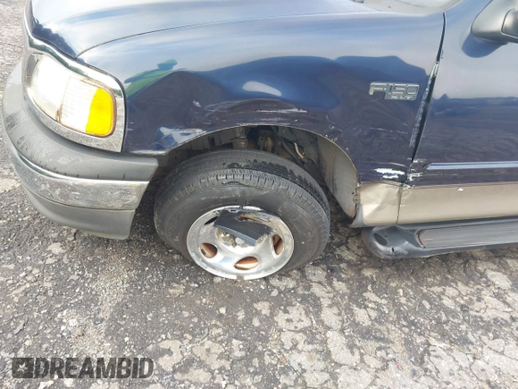 2002 Ford F-150 XL with VIN 1FTRX17202NA66022, listed as a IAAI auction lot 42382320 with 87,916 mi miles and . Bid and sale history available at DreamBid. Image 6.