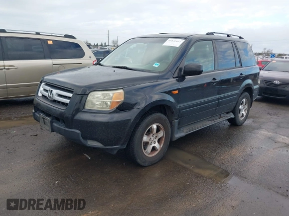 2006 Honda Pilot EX-L with VIN 2HKYF18726H552054, listed as a IAAI auction lot 41822652 with 153,822 mi miles and . Bid and sale history available at DreamBid. Image 2.
