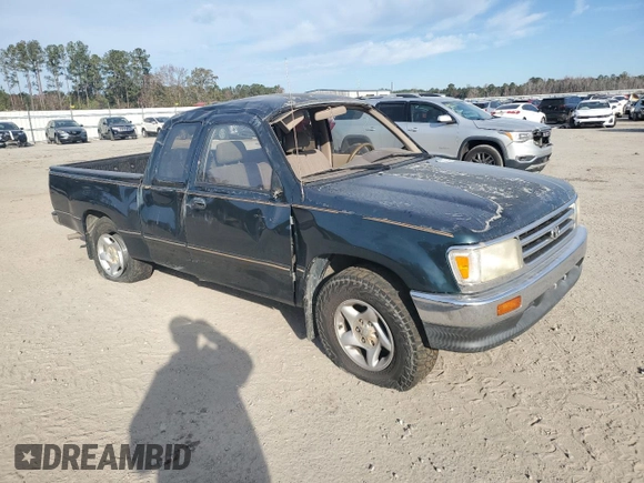 1995 Toyota T100 DX with VIN JT4VD12E1S0012010, listed as a Copart auction lot 83223154 with 253,492 mi miles and Salvage Title. Bid and sale history available at DreamBid. Image 4.