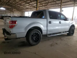 2012 Ford F-150 XL with VIN 1FTFW1EF1CKE10648, listed as a Copart auction lot 63333505 with 160,764 mi miles and Salvage title. Bid and sale history available at DreamBid. Image 3.