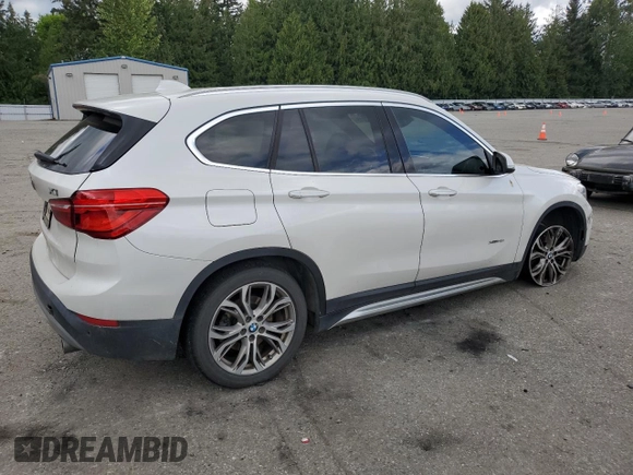 2016 BMW X1 xDrive28i z VIN WBXHT3C30G5E54396, wystawiony jako Copart lot #56042815 z przebiegiem 101 632 mil mil oraz Szkoda całkowita • Salvage title. Historia ofert i sprzedaży dostępna na DreamBid. Obrazek 3.