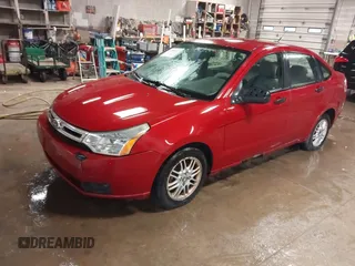 2010 Ford Focus SE with VIN 1FAHP3FNXAW263765, listed as a IAAI auction lot 42058813 with 219,009 mi miles and . Bid and sale history available at DreamBid. Image 2.