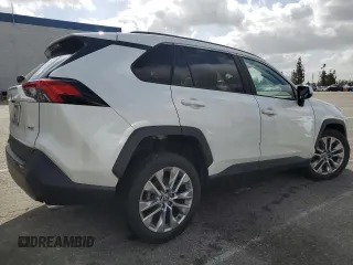 2021 Toyota RAV4 XLE Premium with VIN 2T3C1RFV1MW180625, listed as a Copart auction lot 51799175 with 63,692 mi miles and Salvage title. Bid and sale history available at DreamBid. Image 3.