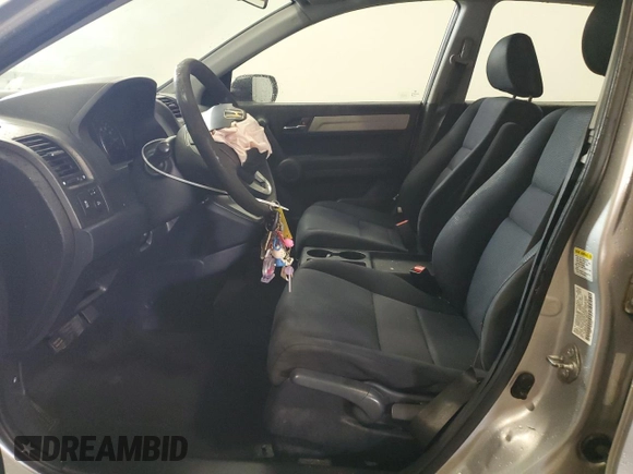 2010 Honda CR-V LX with VIN 5J6RE3H31AL033771, listed as a Copart auction lot 59527085 with 211,765 mi miles and Salvage title. Bid and sale history available at DreamBid. Image 7.
