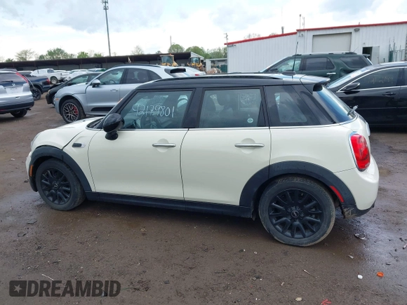 2015 MINI Hardtop 4 Door with VIN WMWXS5C52FT831291, listed as a IAAI auction lot 42179801 with 63,261 mi miles and . Bid and sale history available at DreamBid. Image 15.