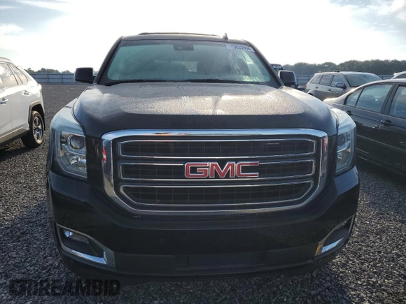 2015 GMC Yukon SLT with VIN 1GKS2BKC9FR118305, listed as a Copart auction lot 73833994 with 0 mi miles and Salvage Title. Bid and sale history available at carsss.com. Image 5.