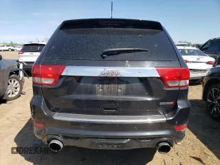 2012 Jeep Grand Cherokee SRT8 with VIN 1C4RJFDJ2CC352056, listed as a Copart auction lot 48810994 with 114,807 mi miles and Salvage Title. Bid and sale history available at carsss.com. Image 6.