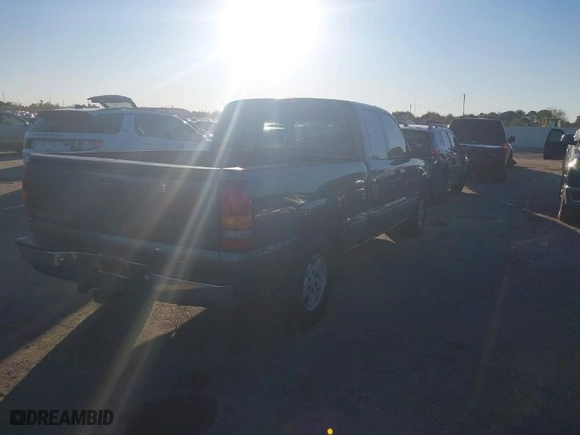 2001 Chevrolet Silverado 1500 LS with VIN 2GCEC19V711128338, listed as a IAAI auction lot 40934362 with 219,613 mi miles. Bid and sale history available at carsss.com. Image 4.