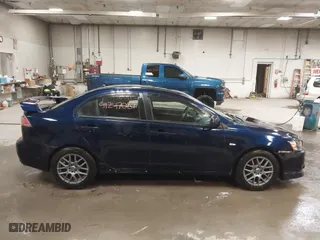 2013 Mitsubishi Lancer SE with VIN JA32V2FW9DU005616, listed as a IAAI auction lot 41247087 with 129,055 mi miles. Bid and sale history available at carsss.com. Image 13.