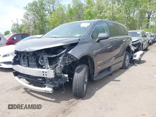 2021 Toyota Sienna XLE with VIN 5TDJRKEC3MS065212, listed as a IAAI auction lot 42086801 with 22,602 mi miles and . Bid and sale history available at DreamBid. Image 2.