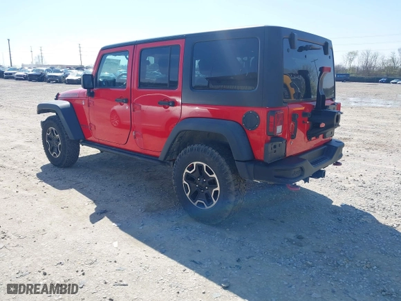 2015 Jeep Wrangler Unlimited Rubicon Hard Rock with VIN 1C4HJWFG9FL525556, listed as a IAAI auction lot 41973576 with 246,949 mi miles. Bid and sale history available at carsss.com. Image 3.