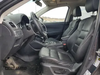 2016 Mazda CX-5 Grand Touring z VIN JM3KE4DY0G0633861, wystawiony jako Copart lot #47748645 z przebiegiem 112 219 mil mil oraz Szkoda całkowita • Salvage title. Historia ofert i sprzedaży dostępna na DreamBid. Obrazek 7.