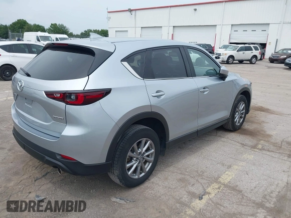 2023 Mazda CX-5 S Carbon Edition z VIN JM3KFBCM3P0197796, wystawiony jako IAAI lot #42408301 z przebiegiem 46 169 mil mil oraz . Historia ofert i sprzedaży dostępna na DreamBid. Obrazek 4.