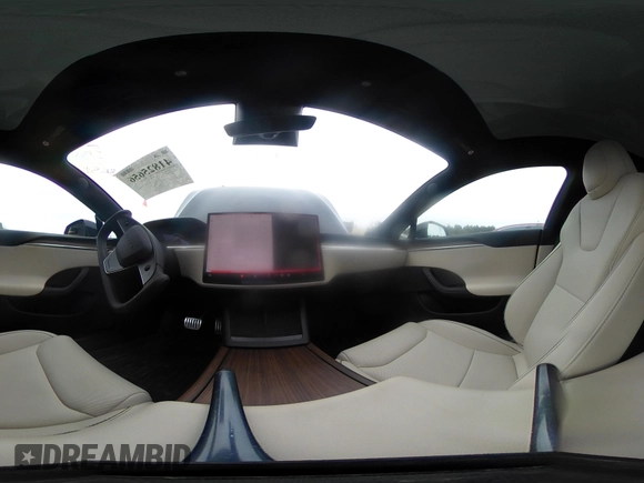 2021 Tesla Model S Plaid with VIN 5YJSA1E69MF439147, listed as a IAAI auction lot 41825656 with 25,626 mi miles. Bid and sale history available at carsss.com. Image 20.