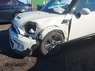 2011 MINI Convertible S with VIN WMWZP3C54BTX82748, listed as a IAAI auction lot 41817396 with 113,458 mi miles and . Bid and sale history available at DreamBid. Image 6.