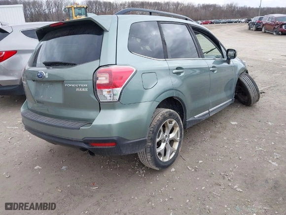 2017 Subaru Forester Touring with VIN JF2SJATC1HH517582, listed as a IAAI auction lot 41710840 with 81,920 mi miles. Bid and sale history available at carsss.com. Image 4.
