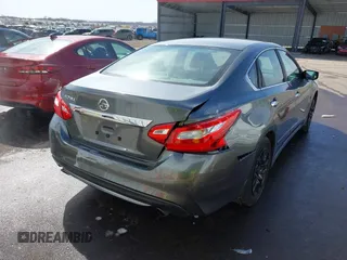 2016 Nissan Altima SV with VIN 1N4AL3AP5GC166005, listed as a IAAI auction lot 41795548 with 111,942 mi miles and . Bid and sale history available at DreamBid. Image 6.
