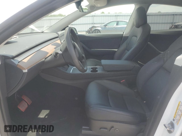 2022 Tesla Model Y Long Range z VIN 7SAYGDEE9NF455614, wystawiony jako Copart lot #57612985 z przebiegiem 22 101 mil mil oraz Szkoda całkowita • Salvage title. Historia ofert i sprzedaży dostępna na DreamBid. Obrazek 7.