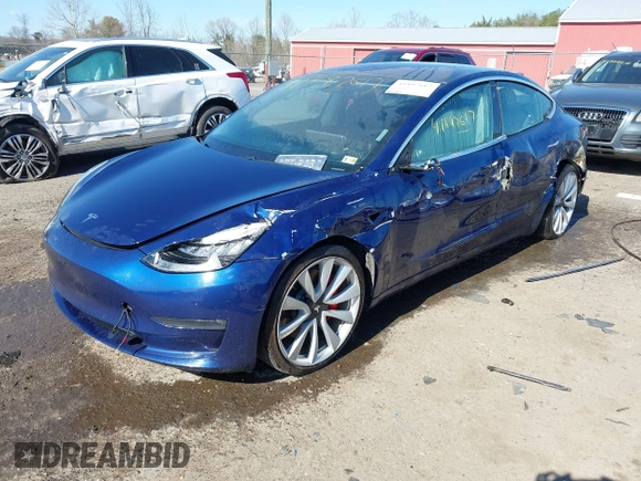 2018 Tesla Model 3 Long Range Battery z VIN 5YJ3E1EB5JF180030, wystawiony jako IAAI lot #41897617 z przebiegiem 89 557 mil mil oraz . Historia ofert i sprzedaży dostępna na DreamBid. Obrazek 19.
